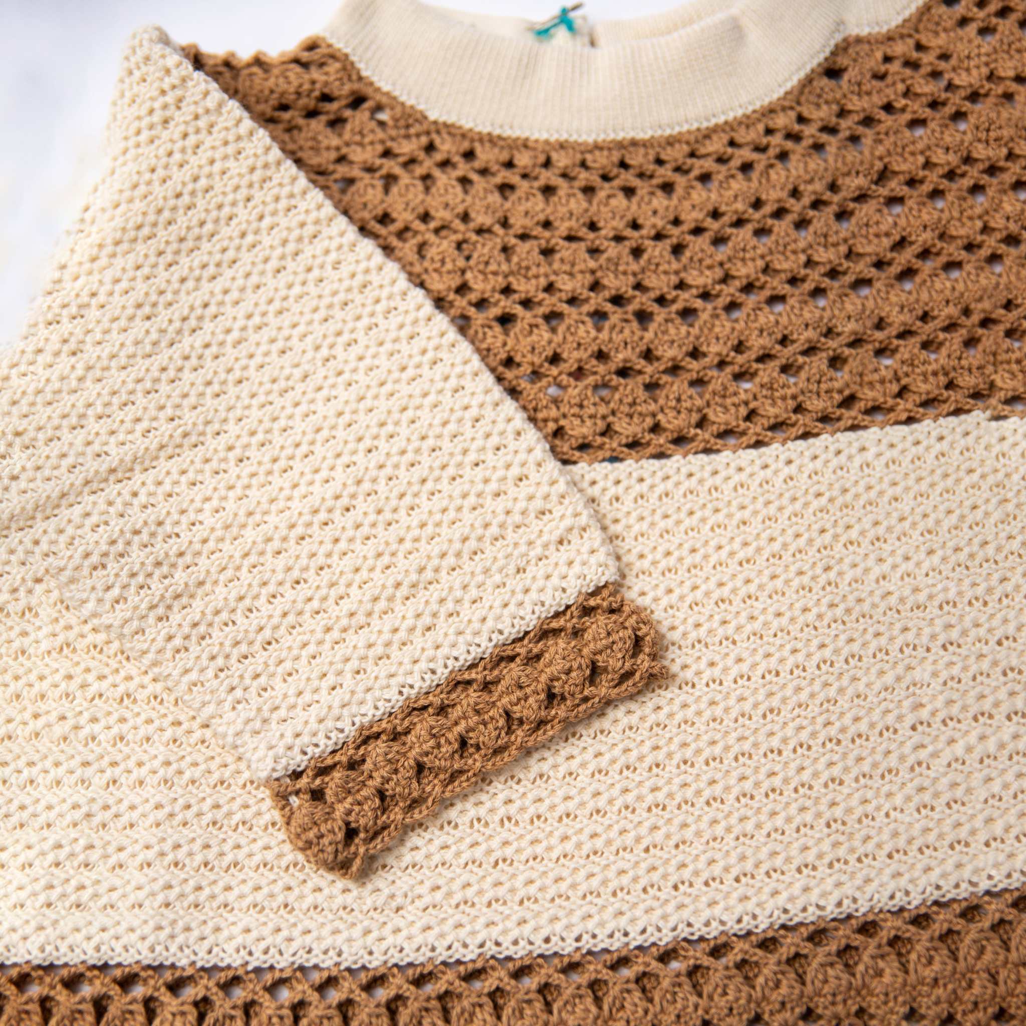 Detailed view of the coffee and white ella dress